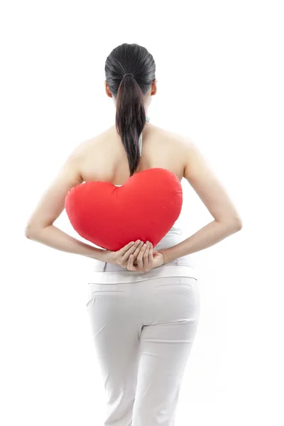 Portrait of attractive asian woman holding red heart isolated on white studio shot — Stock Photo, Image