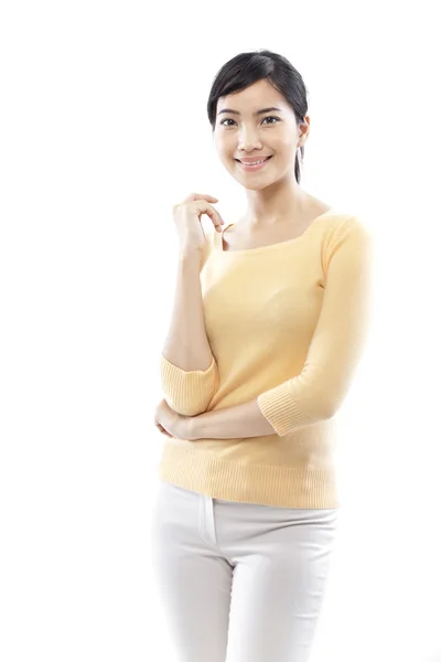 Confident woman against a white background — Stock Photo, Image