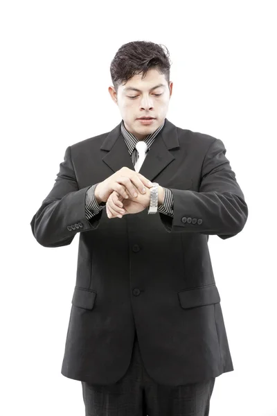 Empresario mirando la hora — Foto de Stock