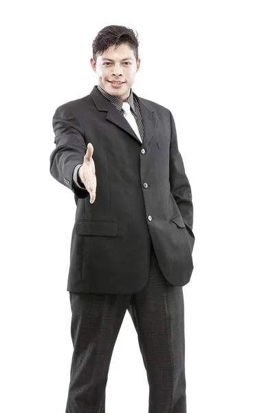 Happy businessman with an open hand ready to seal a deal. Isolated on white background. — Stock Photo, Image