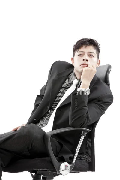 Retrato de un hombre de negocios sentado y pensando — Foto de Stock