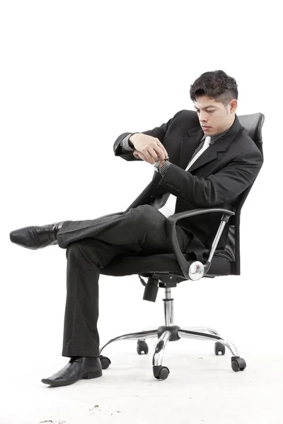 Businessman looking at the time — Stock Photo, Image