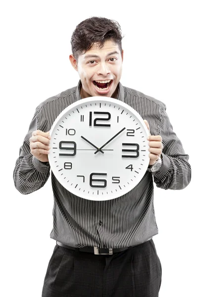 Zeitkonzept, Geschäftsmann hält große Uhr und gibt den Ausdruck auf seinem Gesicht — Stockfoto