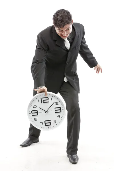 Portrait of a businessman putting the clock — Stock Photo, Image
