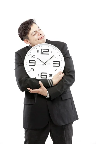 Preservation of times,close up of young businessman with analog clock isolated on white background — Stock Photo, Image