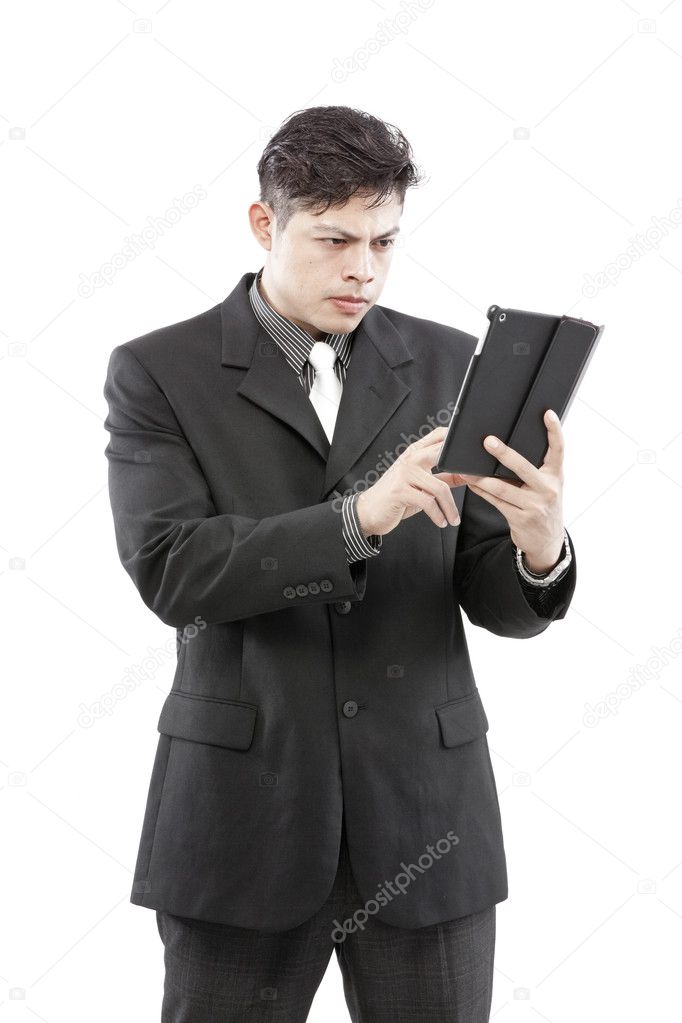 Portrait of a businessman with digital tablet