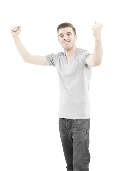 Hombre casual disfrutando de su éxito aislado sobre fondo blanco — Foto de Stock