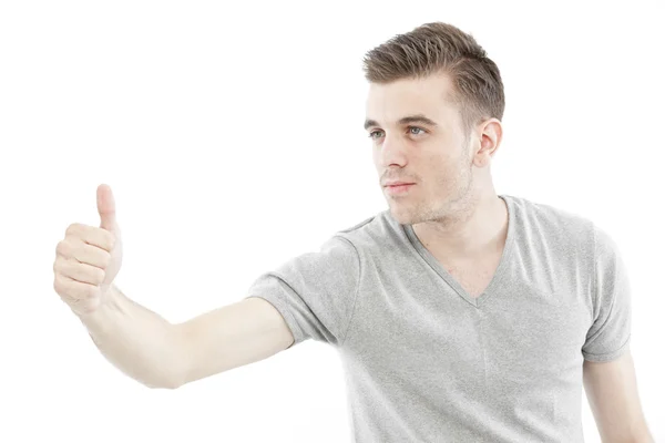 Casual man with his hand showing approval hand sign isolated on white background Stock Photo