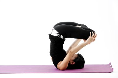 pratik yoga bir hasır üzerinde sevimli genç Asyalı kadın portresi