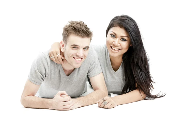 Cute couple lying on the floor — Stock Photo, Image