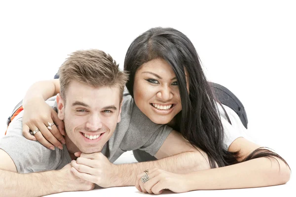 Cute couple lying on the floor — Stock Photo, Image