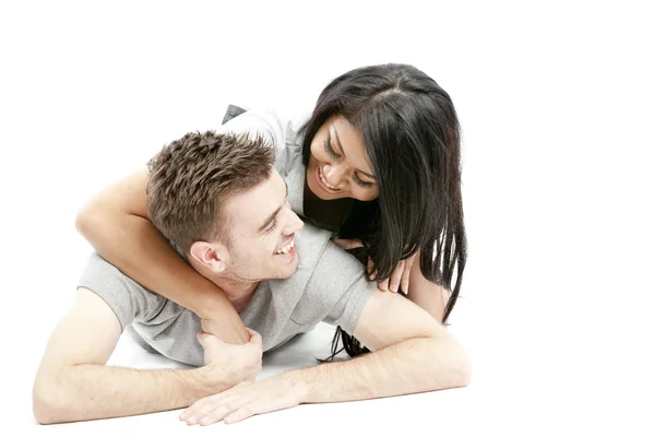 Cute couple lying on the floor — Stock Photo, Image