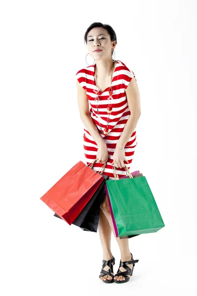 Krásná žena s mnoha nákupní tašky — Stock fotografie
