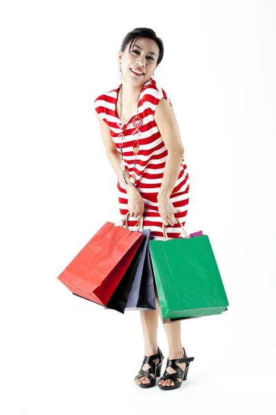 Piękna kobieta z dużą ilością torby na zakupy — Zdjęcie stockowe