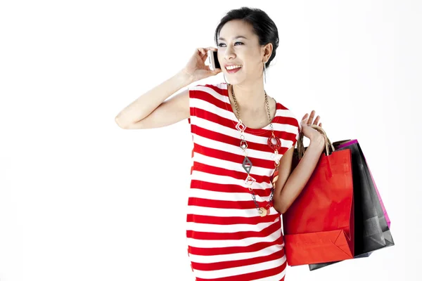 Piękna kobieta z dużą ilością torby na zakupy — Zdjęcie stockowe
