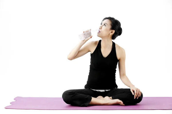 Sports woman drinks water — Stock Photo, Image