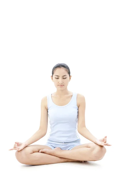 Portrait of pretty young woman doing yoga exercise — Stock Photo, Image