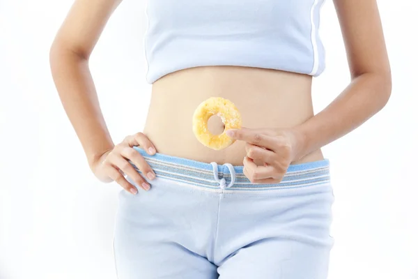 Dieta mujer sosteniendo donut — Foto de Stock