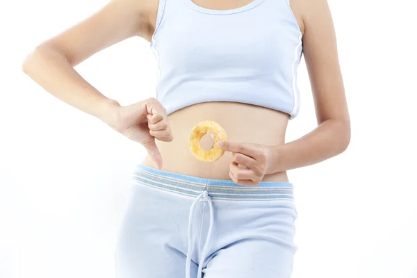 Mulher da dieta segurando donut — Fotografia de Stock