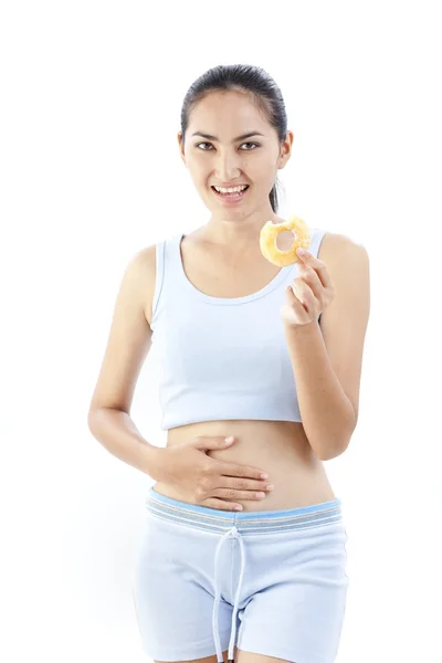 Mulher da dieta segurando donut — Fotografia de Stock