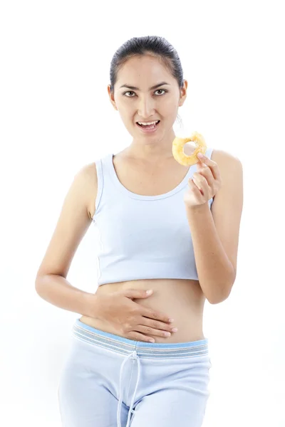 Mulher da dieta segurando donut — Fotografia de Stock