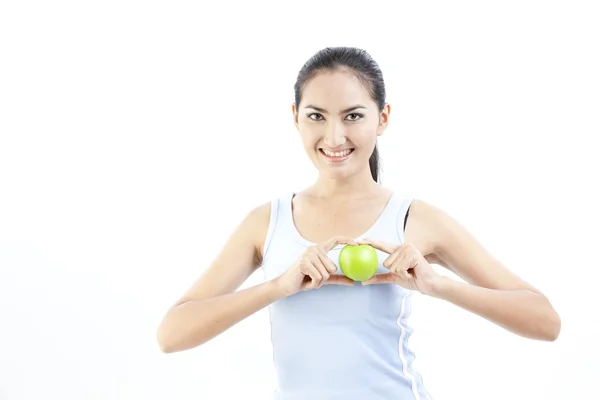 Beautiful asian woman holding green apple on white — Stock Photo, Image