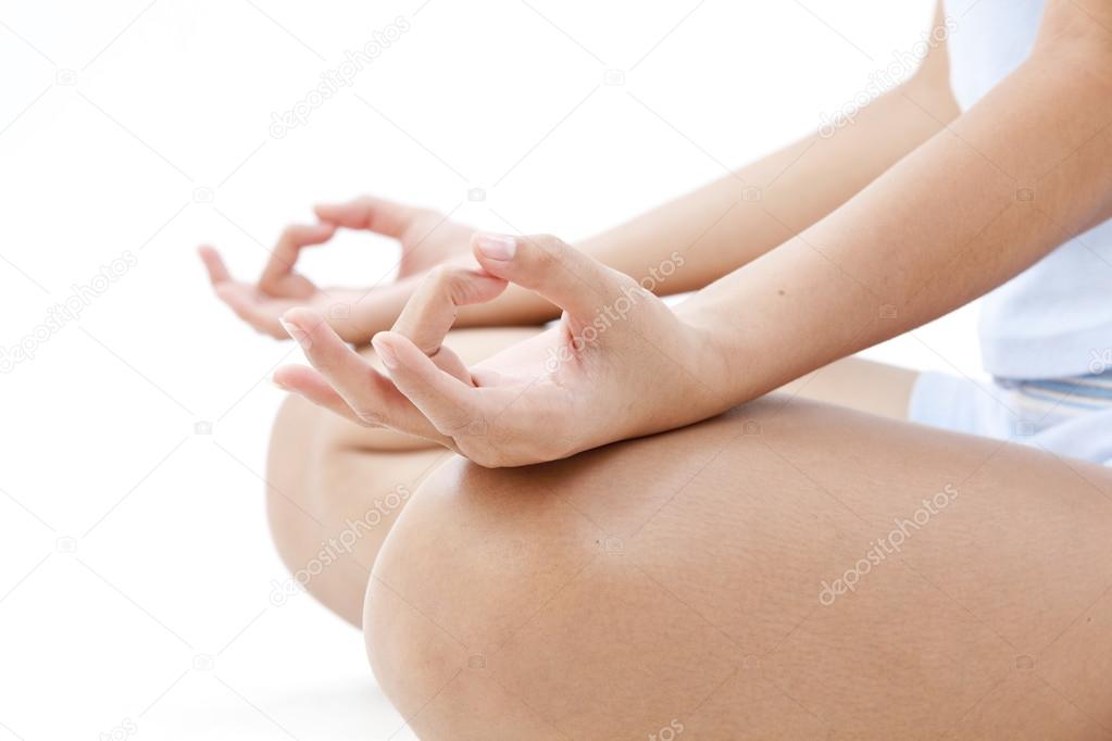 Portrait of pretty young woman doing yoga exercise