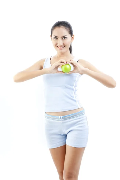 Hermosa mujer asiática sosteniendo manzana verde en blanco — Foto de Stock