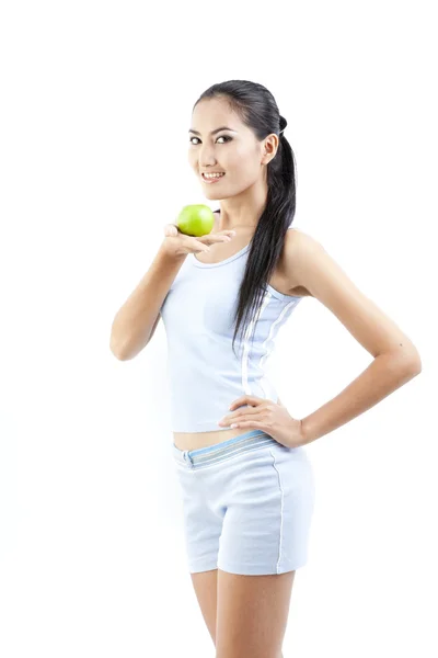 Beautiful asian woman eat green apple on white — Stock Photo, Image