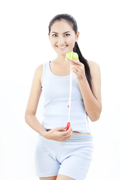 아름 다운 아시아 여자는 흰색 배경에서 그녀의 손에 애플 개최 — 스톡 사진