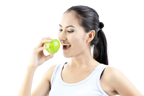 Beautiful asian woman hold apple in her hand on white background Royalty Free Stock Images