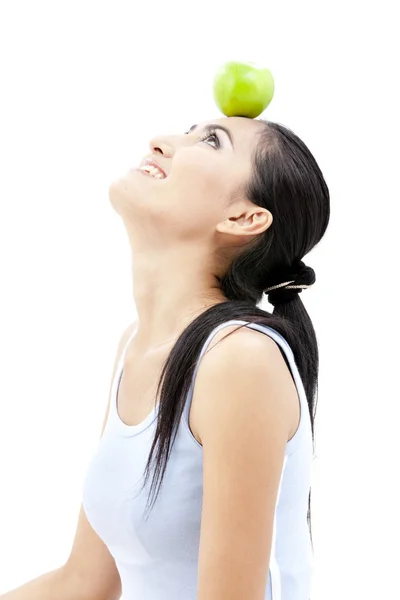 Beautiful asian woman hold apple in her head on white background — Stock Photo, Image