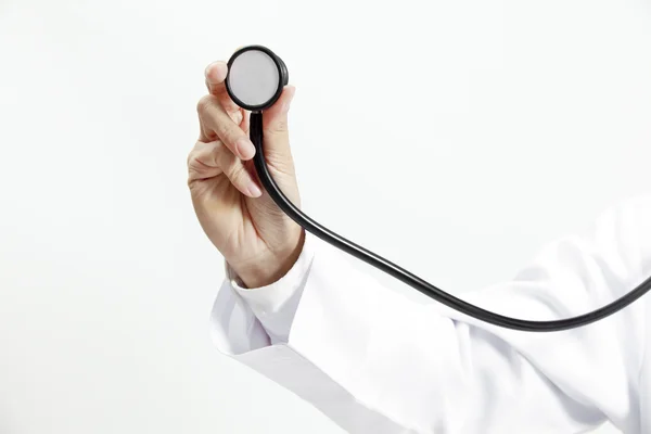 Doctor with stethoscope.Selecti ve focus on the stethoscope. — Stock Photo, Image