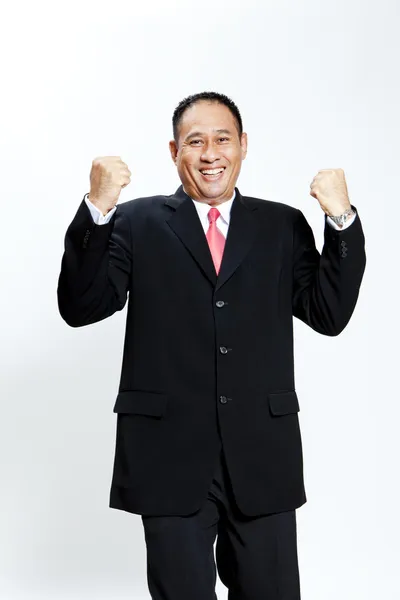 Portrait of a energetic mature businessman enjoying success against white - Isolated — Stock Photo, Image