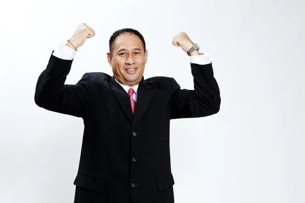 Portrait of a energetic mature businessman enjoying success against white - Isolated — Stock Photo, Image