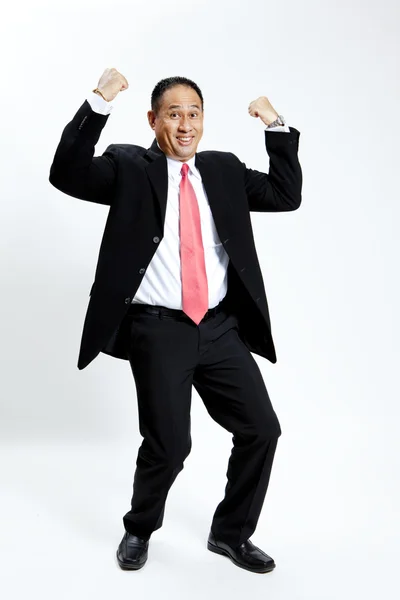 Portrait of a energetic mature businessman enjoying success against white - Isolated — Stock Photo, Image