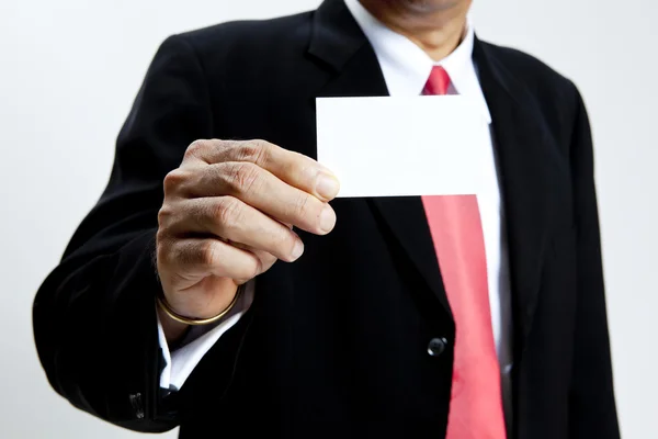 Portrait business man holding blank note card — Stock Photo, Image