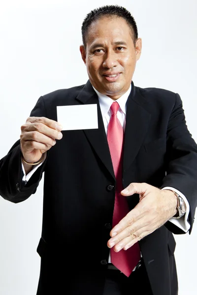 Portrait business man holding blank note card — Stock Photo, Image