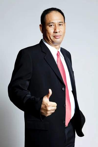 Executive giving hand sign — Stock Photo, Image