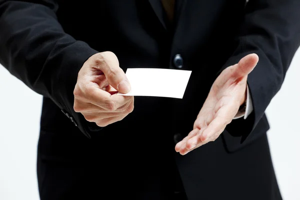 Retrato de hombre de negocios con tarjeta de nota en blanco — Foto de Stock