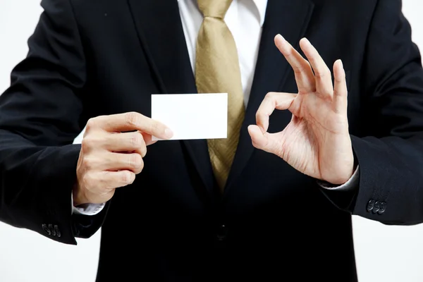 Retrato de hombre de negocios con tarjeta de nota en blanco — Foto de Stock