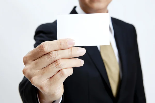 Retrato de hombre de negocios con tarjeta de nota en blanco —  Fotos de Stock