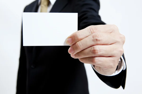 Retrato de hombre de negocios con tarjeta de nota en blanco —  Fotos de Stock