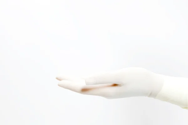 Lékař si dlaň směřuje nahoru. izolované na bílém. — Stock fotografie