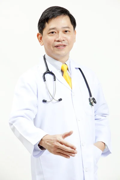 Happy senior chief doctor offering his handshake — Stock Photo, Image