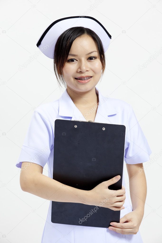 Closeup of an attractive young woman nurse with a smile