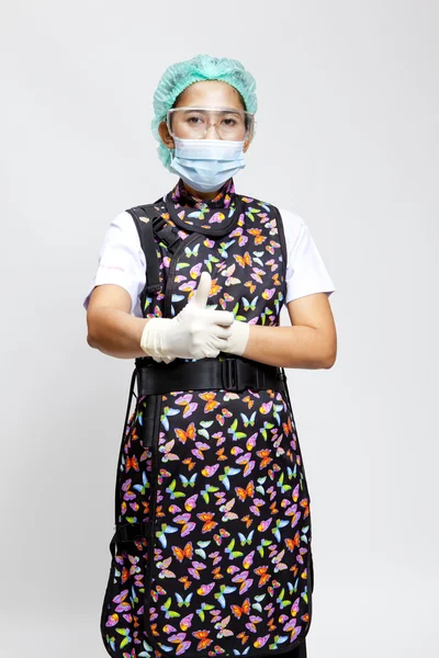 Genç kadın, Doktor maskesi ile gülümseyen — Stok fotoğraf
