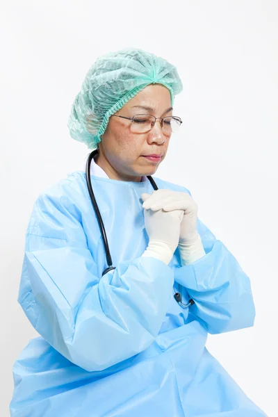 Closeup Portrait of female doctor over white background — Stock Photo, Image