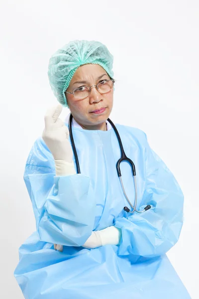 Closeup Portrait of female doctor-crossed fingers over white background — Stock Photo, Image