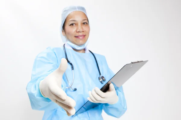 Female doctor handshaking — Stock Photo, Image